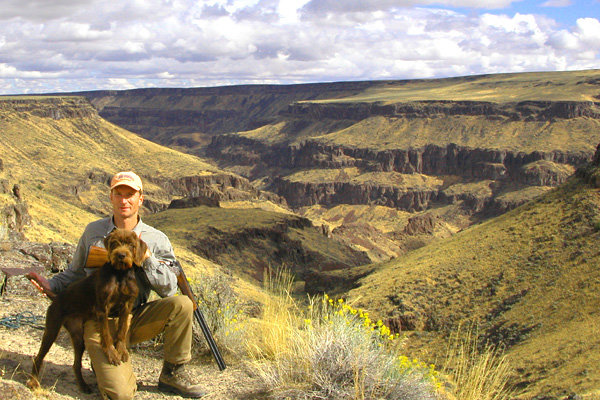 Idaho's famous Bruneau River Canyon will test the legs of any seasoned chukar hunter.  If one stays on the flats at the top it's certainly simplified.  We went clear to the bottom of the canyon on this September day as the birds were still near water and the dogs needed the cooling off to continue the hunt.  I only encountered 2 rattlesnake during this hunt.  Picture is Darren Meacham with six months old Prairie Trouts EZ Playmate (aka Izzy).  Darren is one of our Cedarwood gundog trainers.