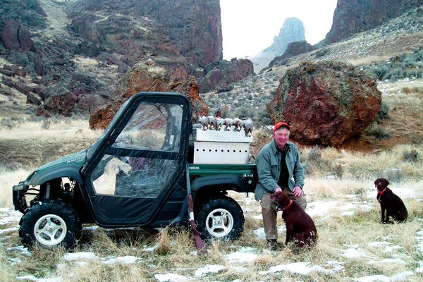 It's December now and the mud tires and cab enclosure are necessary to make the long winter trips much cozier.  Pictured is Dick Nachbar with Dreamworks Hussy and Cedarwoods Northern Star after a grueling day on the mountain.