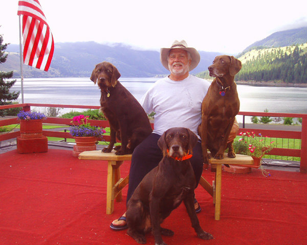 Jon Hickerson at his beautiful Wallowa Lake, Oregon "lake house" posing with Cedarwoods First Offense and Jon's 2 ladies.