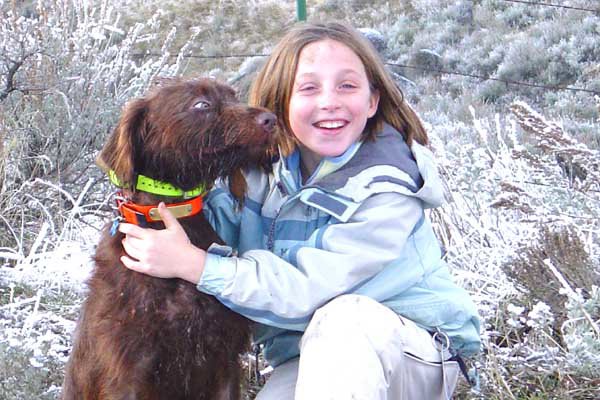 Todd Points daughter Lou with their young pudelpointer "Gauge"on a hunting break.  At 5 months old this dog was hunting like a veteran on pheasants, duck, and chukar.   It does help a bunch when the pup sees 3-4 hunting days per week.    Ten year old Lou says she will be the next owner of Cedarwood Kennels when she grows up.