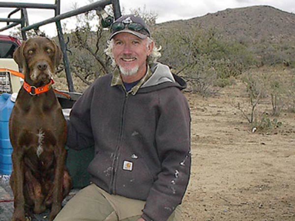 Ted Hamilton with his Cedarwood pudelpointer in Arizona on one of the many quail hunts Ted and his hunting buddy share.    Ted has earned a NAVHDA Prize I in natural ability, a Prize II in UPT, and a Prize II in UT with his Cedarwood pudelpointer.  Ted  is currently the president of the Arizona chapter of NAVHDA.