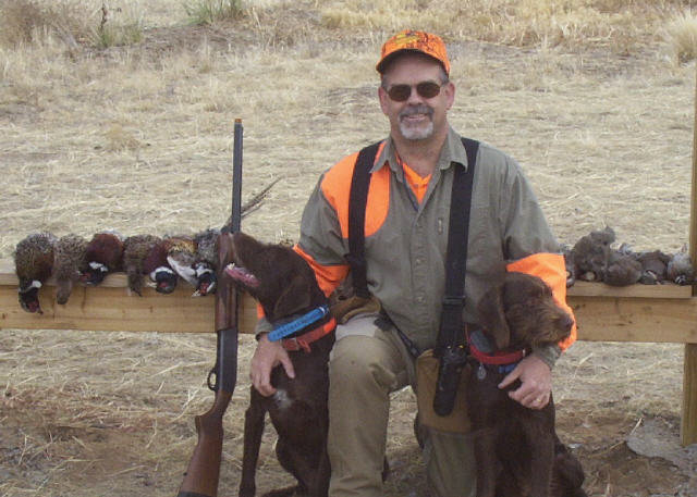 Dale Parker in Colorado with his 2 Cedarwood pudelpointers following a successful day in the field.    Dale has done an excellent job training these 2 dogs and a true supporter of this breed for what the PP has brought into his life, both in the field and in the home.