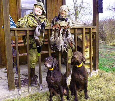 Here they are looking their very best.  "The duck Boys from Idaho".  Grandsons Brett Littrell and Hunter Farris.  Duck Dynasty has nothing over on these two.  Both have their own pudelpointers and never go to the duck blind without them.